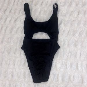 Ribbed black cut-out one-piece; size XS